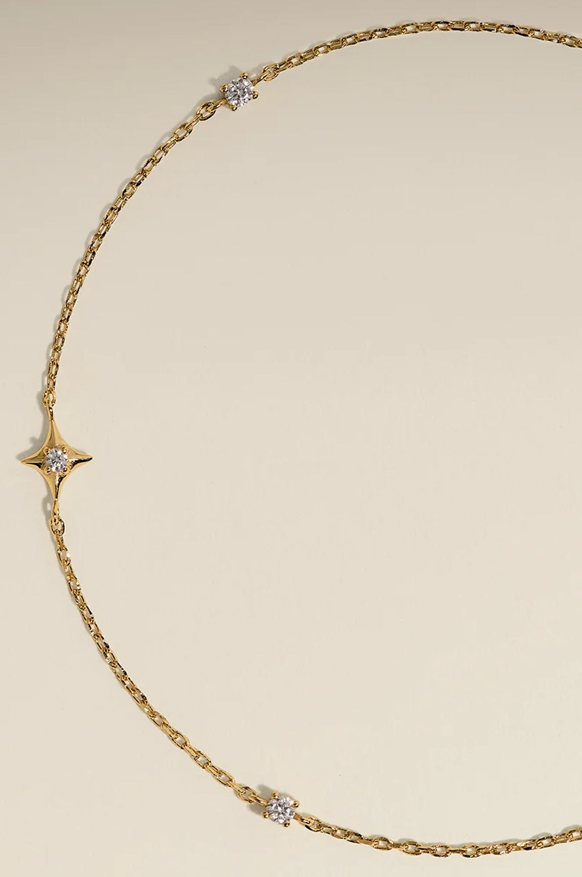 Cosmic Star Charm Bracelet in Gold