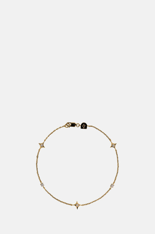 Cosmic Star Charm Bracelet in Gold